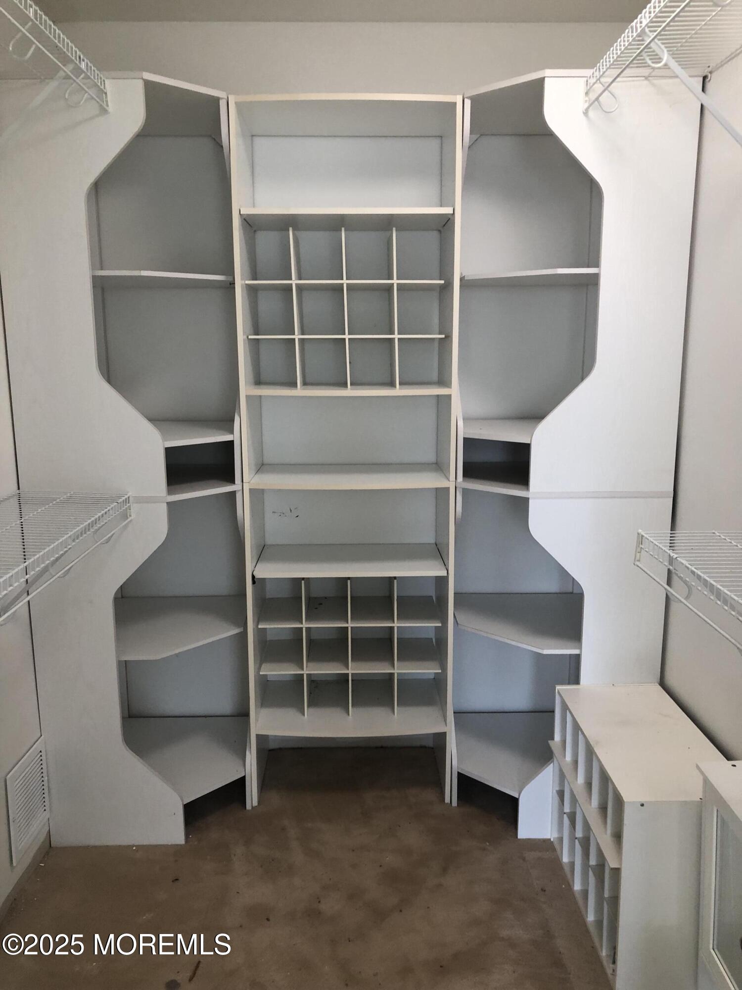 683 Princess Court Toms River, NJ 08753 - Photo 19 of 22 a view of closet area with empty racks