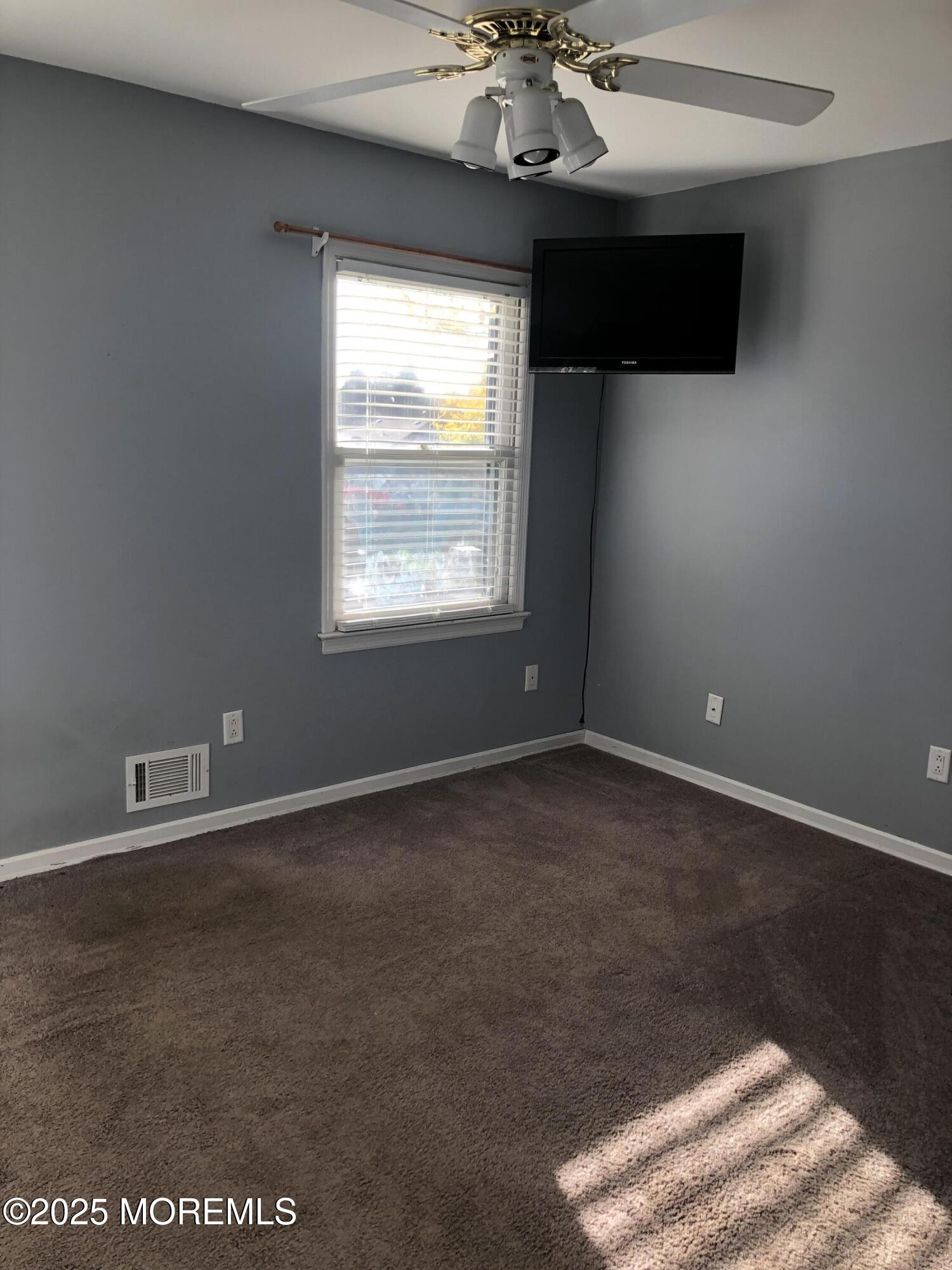 683 Princess Court Toms River, NJ 08753 - Photo 20 of 22 an empty room with a window