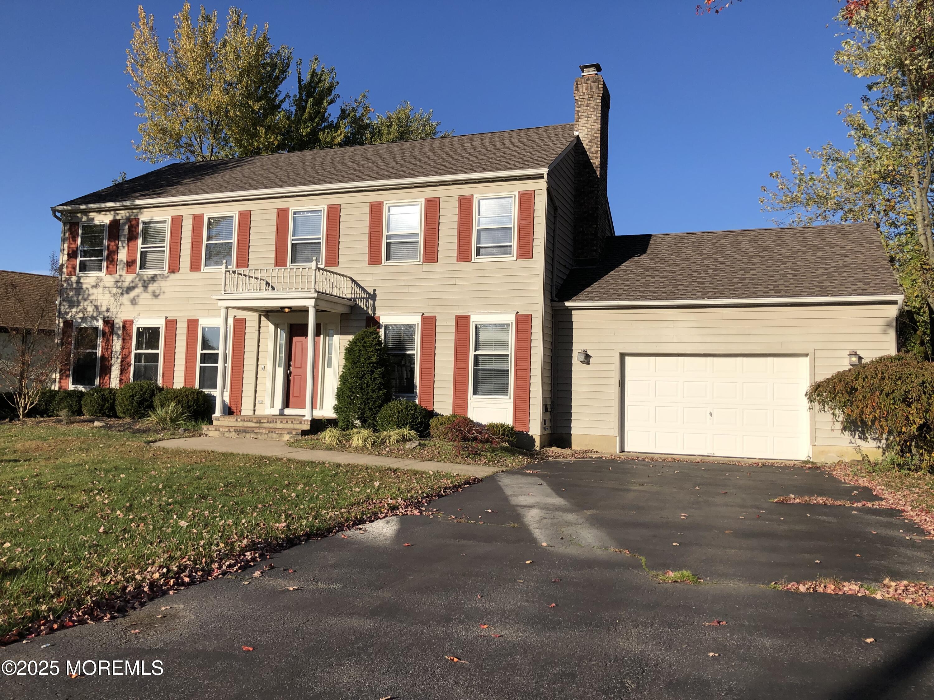 683 Princess Court Toms River, NJ 08753 - Photo 2 of 22 a front view of a house with a yard