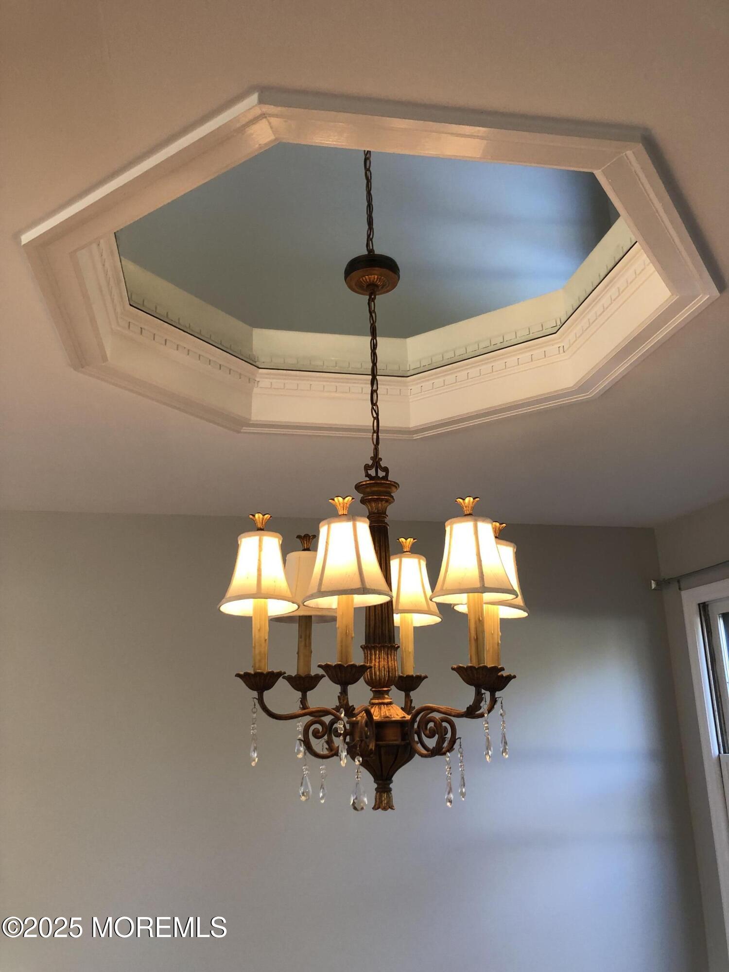 683 Princess Court Toms River, NJ 08753 - Photo 6 of 22 a room with a chandelier furniture and windows