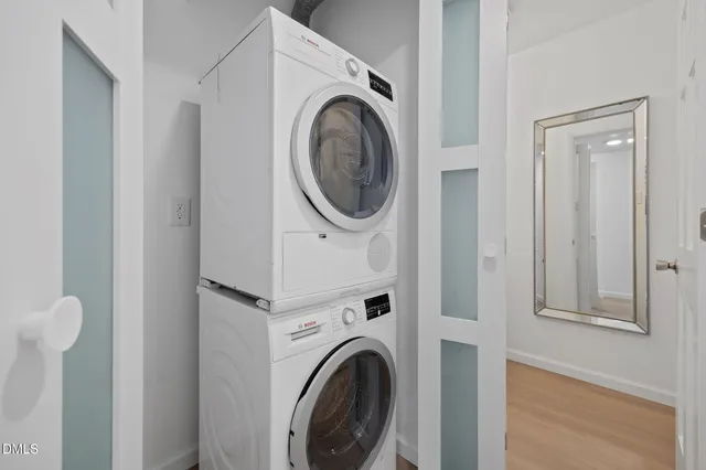 a backyard of a house with outdoor seating