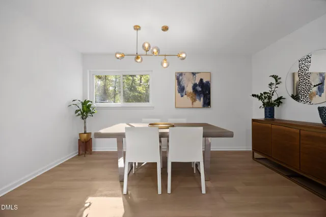 a view of a hallway with washer and dryer