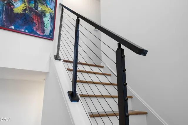 a view of a livingroom with furniture and workspace