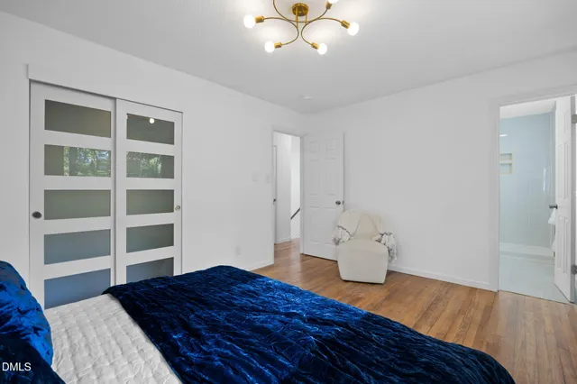 a view of hall way with furniture