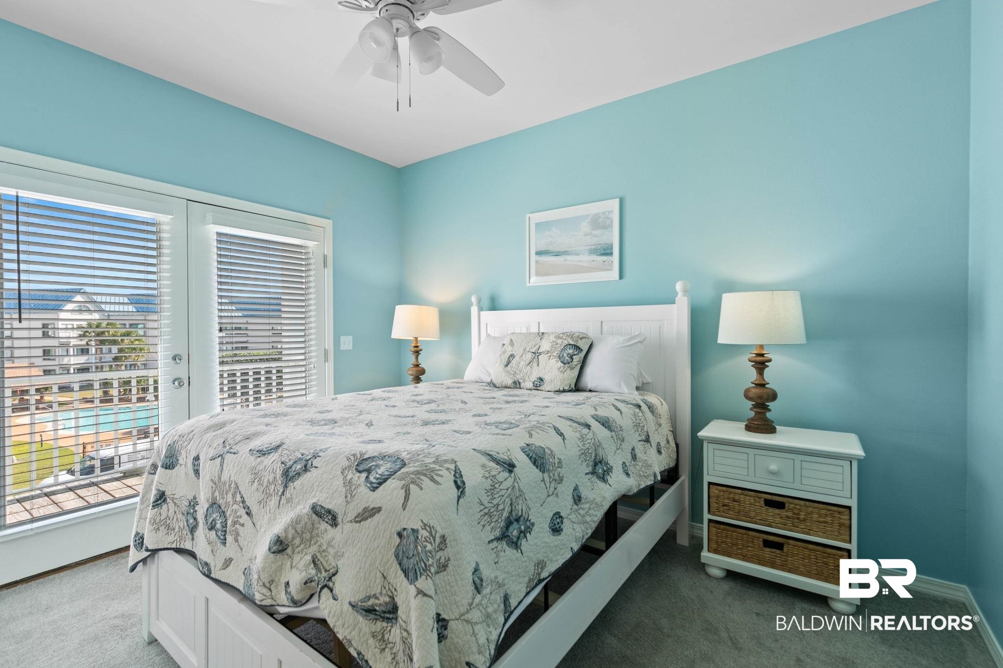 545 Plantation Road, Unit 3 Gulf Shores, AL 36542 - Photo 33 of 54 Bedroom with carpet, access to outside, and a ceiling fan