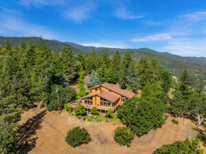 1999 Tolman Creek Road Ashland, OR 97520 - Photo 1 of 1 a view of a house with a yard