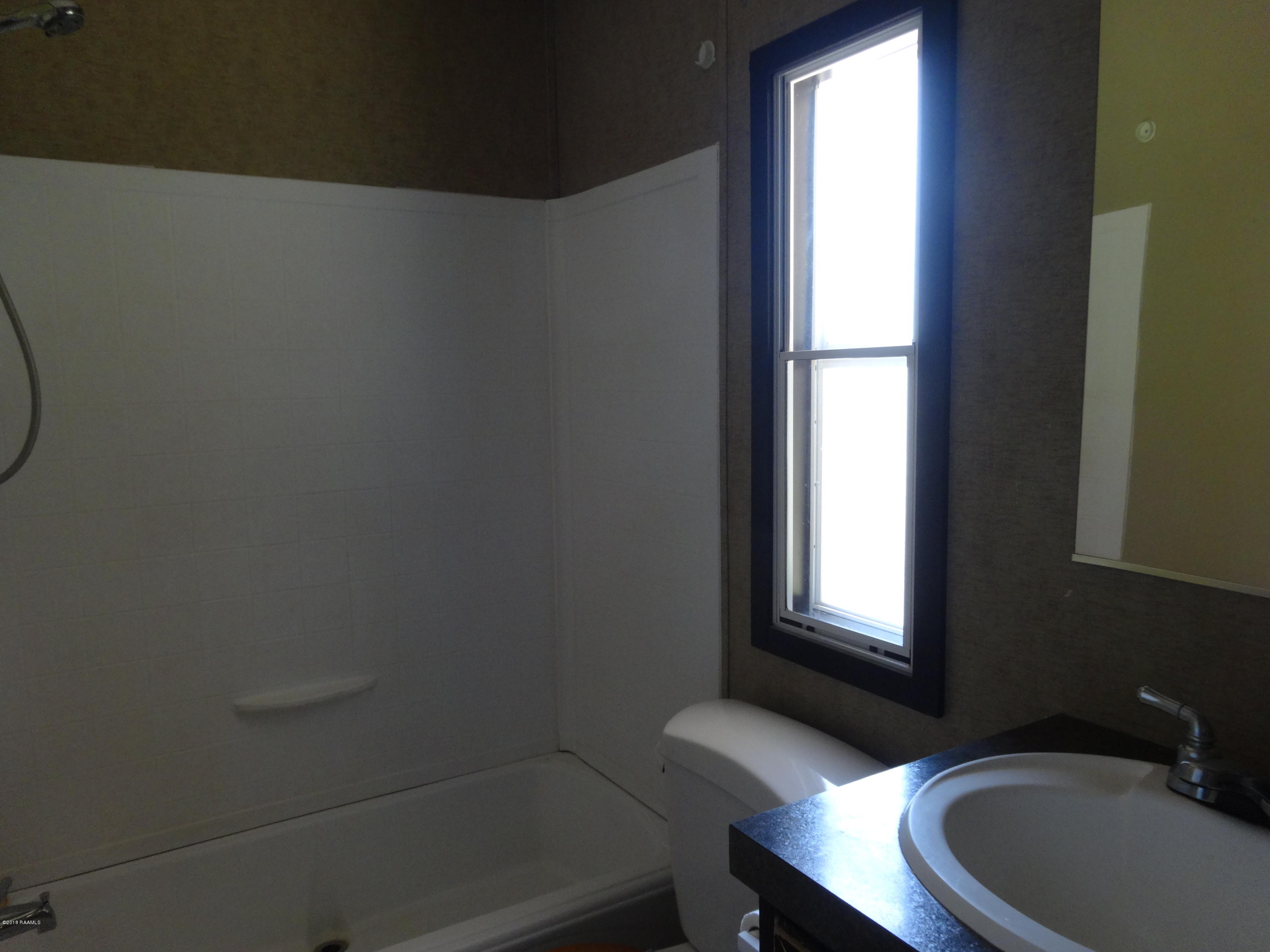 201 La Rue Rhiems Duson, LA 70529 - Photo 18 of 23 Guest Bathroom