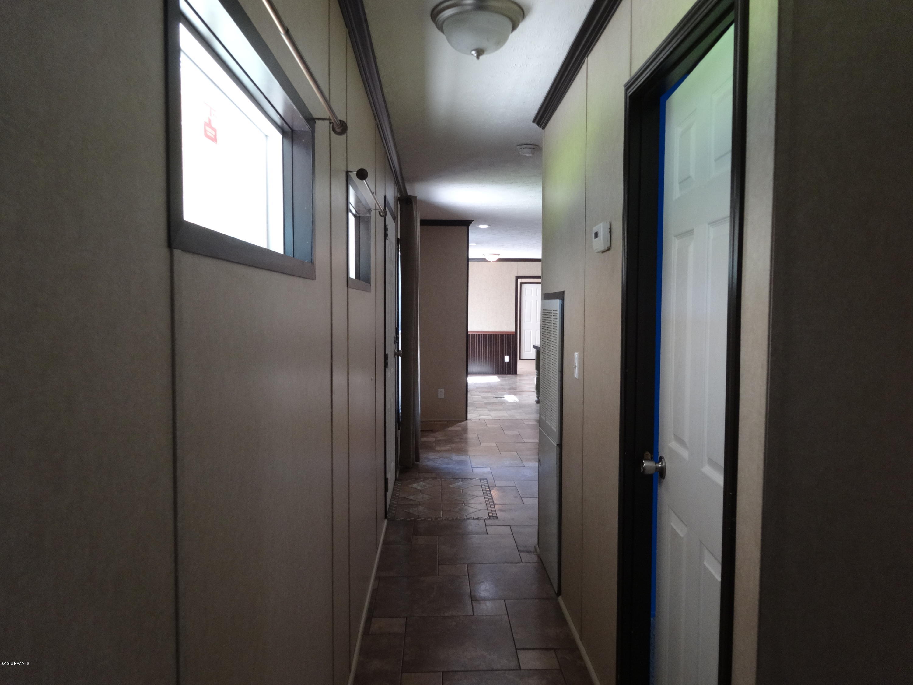 201 La Rue Rhiems Duson, LA 70529 - Photo 19 of 23 Hallway to Living Area
