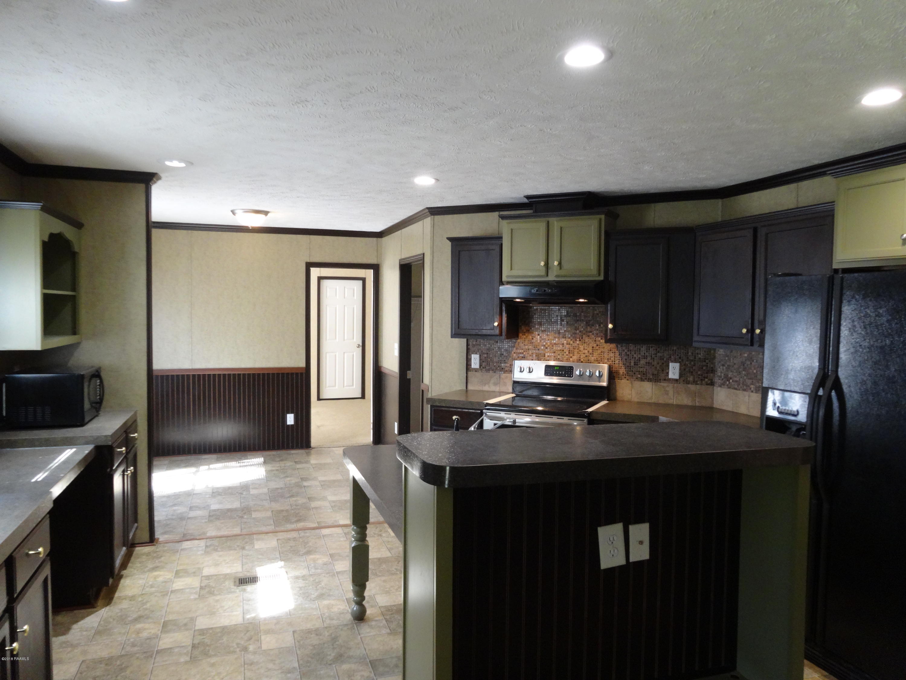 201 La Rue Rhiems Duson, LA 70529 - Photo 5 of 23 Dining Room to Rear