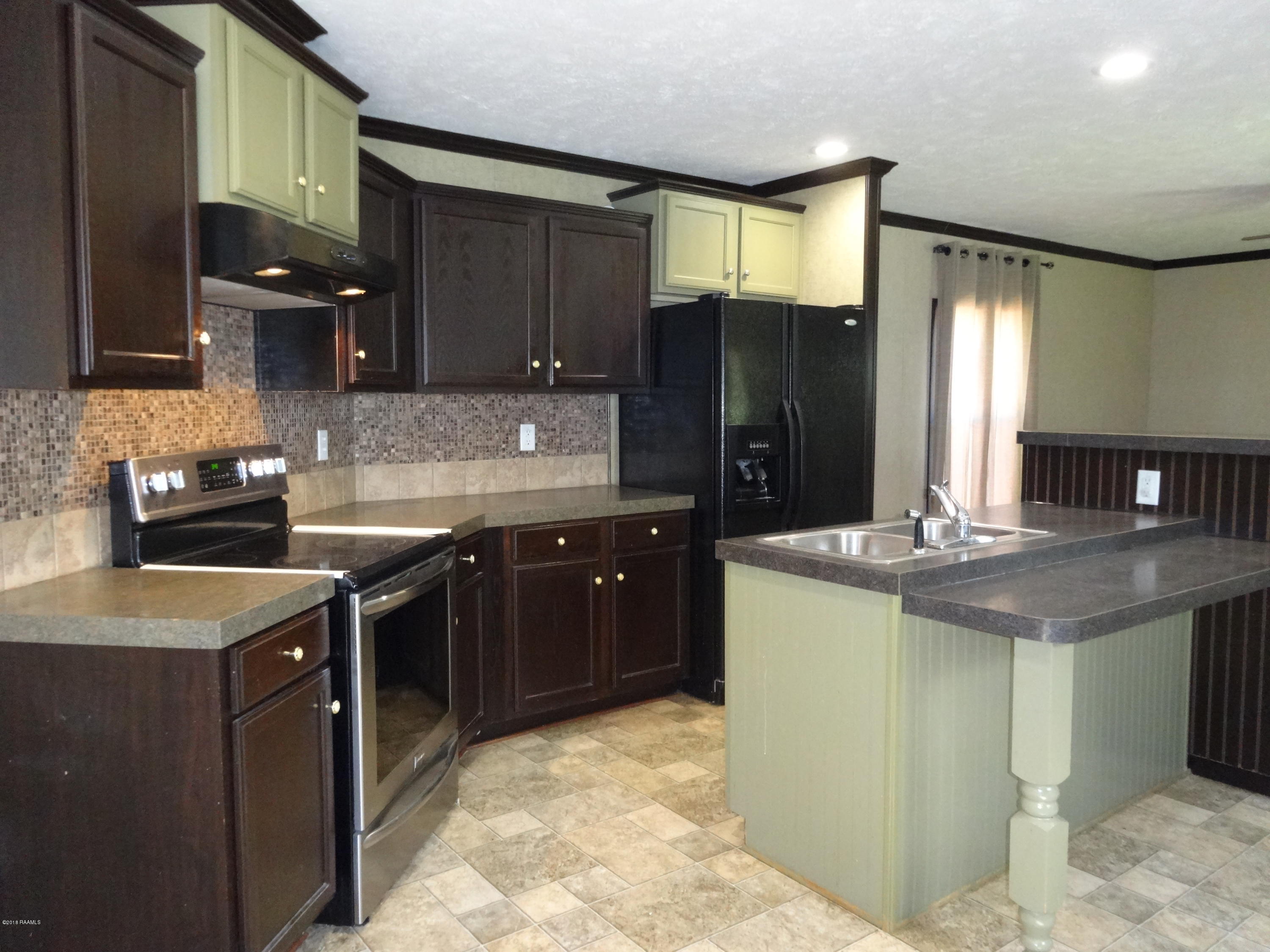 201 La Rue Rhiems Duson, LA 70529 - Photo 7 of 23 Kitchen Cabinetry
