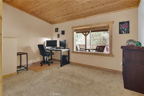 a workspace with furniture and a window