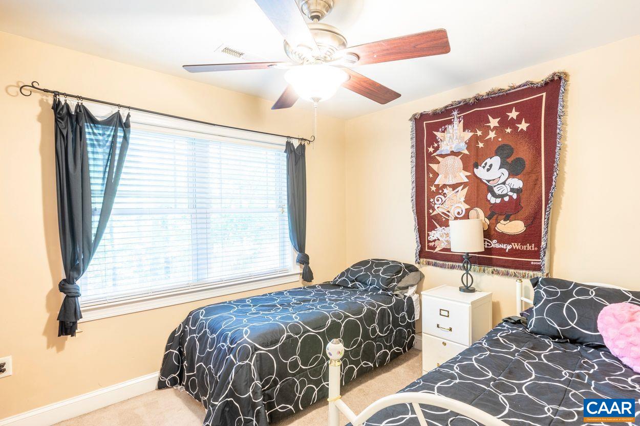 6444 Spring Hill Road Ruckersville, VA 22968 - Photo 15 of 31 a bedroom with a bed and a window