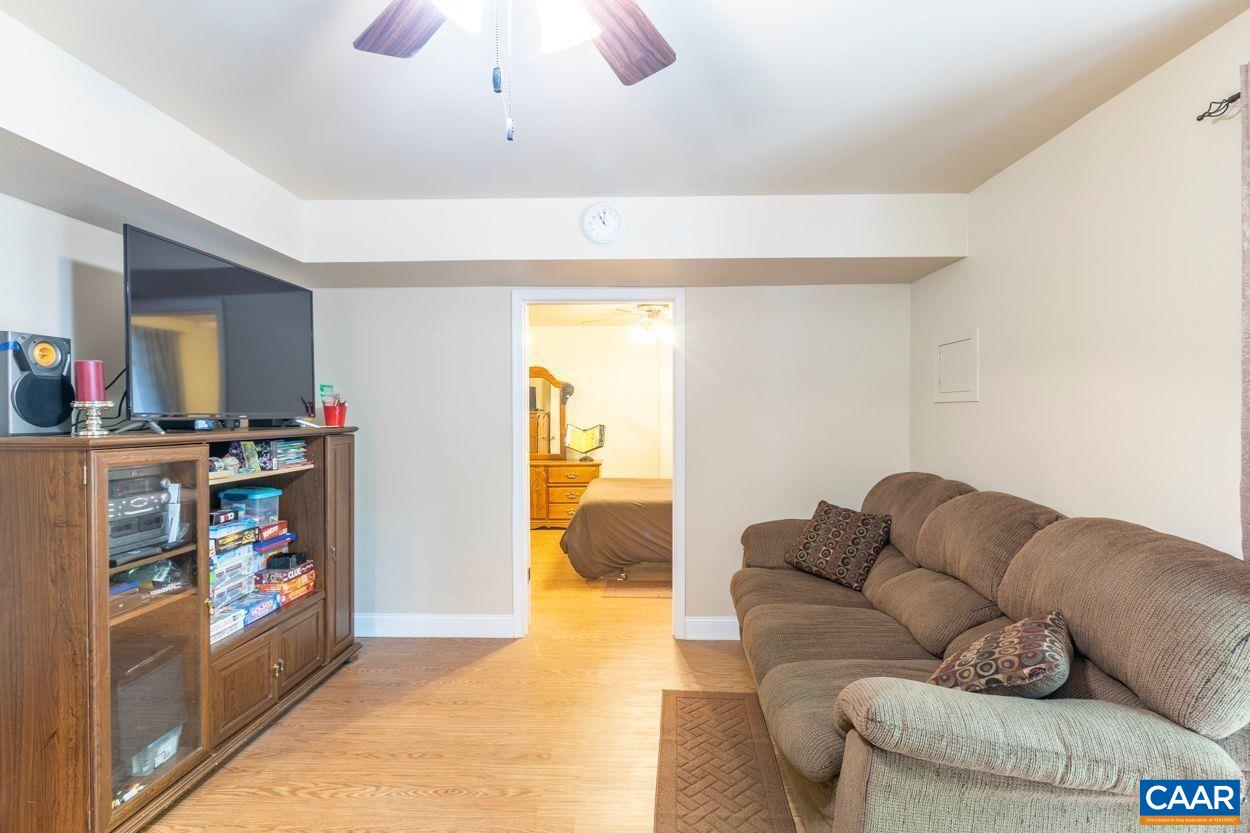 6444 Spring Hill Road Ruckersville, VA 22968 - Photo 23 of 31 a living room with furniture and a couch
