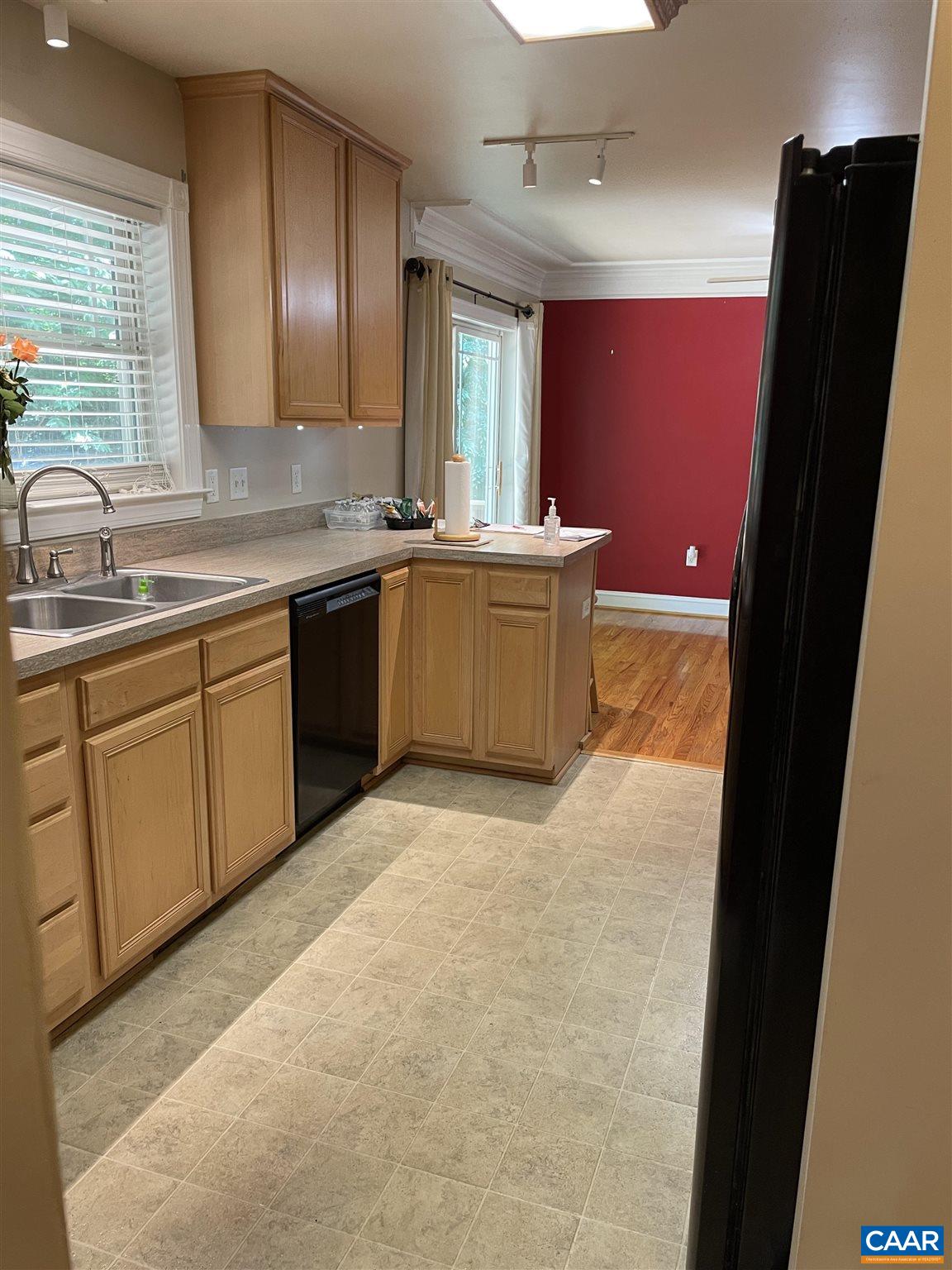6444 Spring Hill Road Ruckersville, VA 22968 - Photo 28 of 31 a bathroom with a granite countertop sink a mirror and a bathtub
