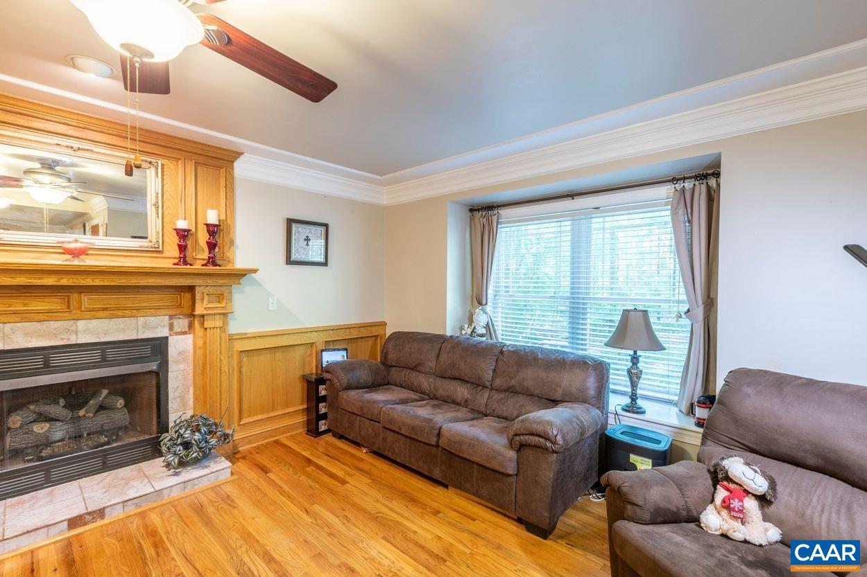 6444 Spring Hill Road Ruckersville, VA 22968 - Photo 8 of 31 a living room with furniture and a fireplace