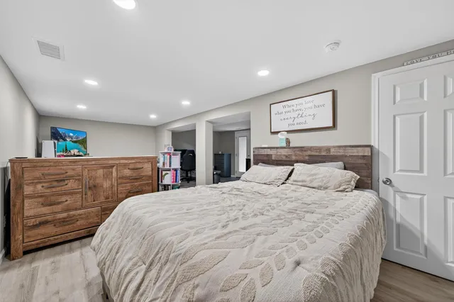 a room with furniture and wooden floor