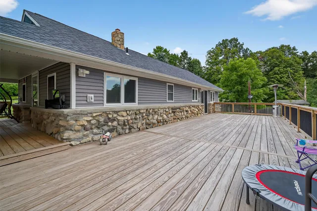 a room with musical instruments and air hockey table