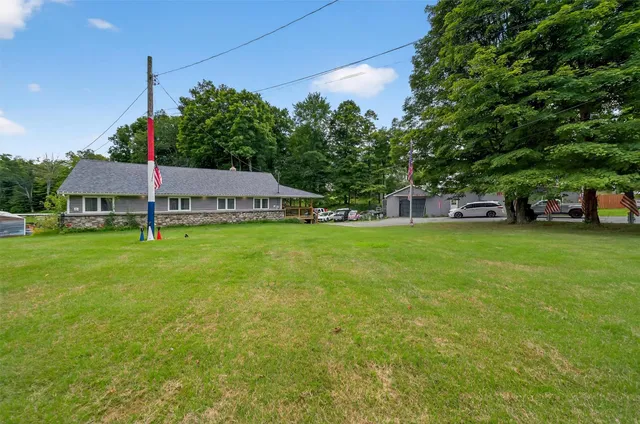 a view of a deck with a wooden fence