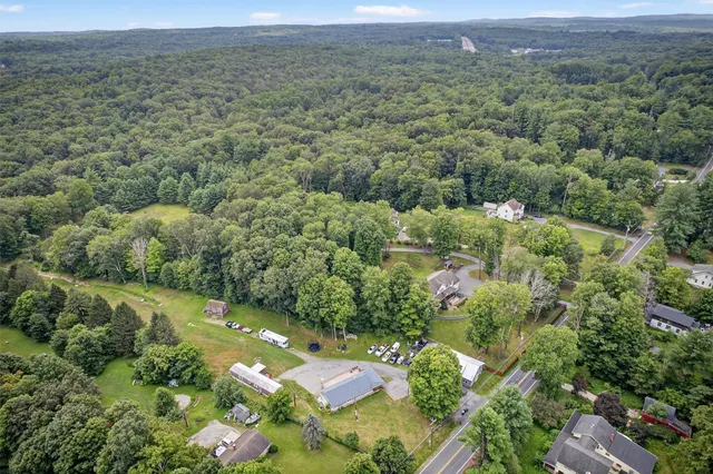 a backyard of a house with lots of green space