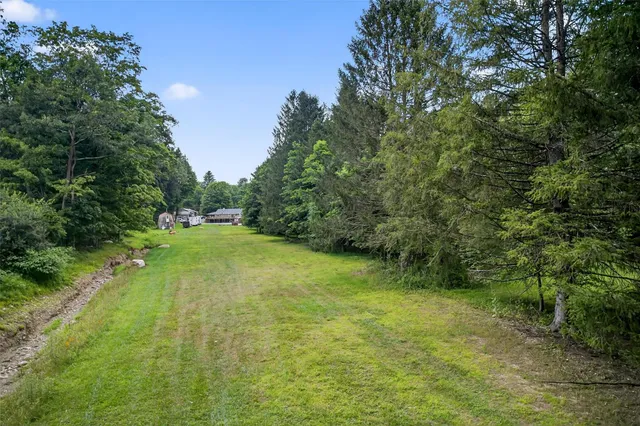 a view of a lake with a house