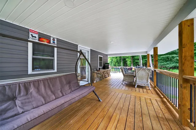 a view of a two chairs in balcony