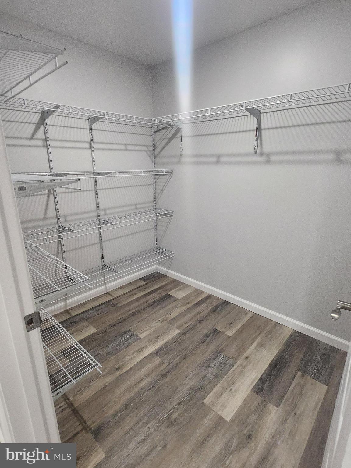 65 Woods Edge Road, Unit 18 Fort Ashby, WV 26719 - Photo 7 of 12 a view of a room with racks on the wall