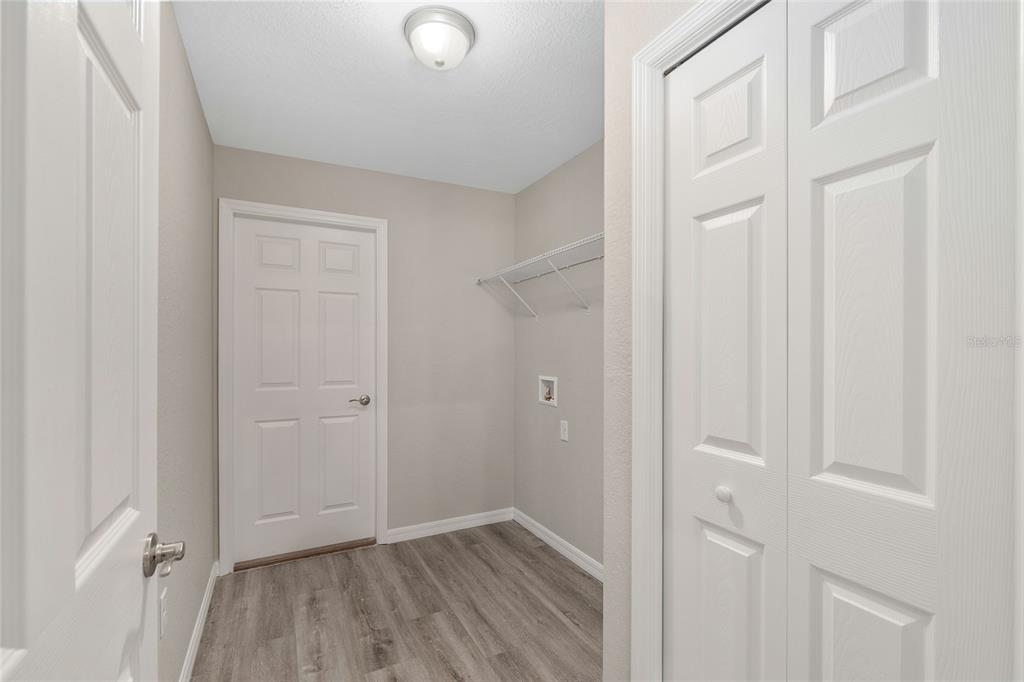 19230 Southwest 97th Street Dunnellon, FL 34432 - Photo 25 of 30 a view of empty room with wooden floor