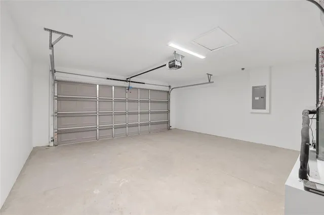 a view of an empty room with a fireplace