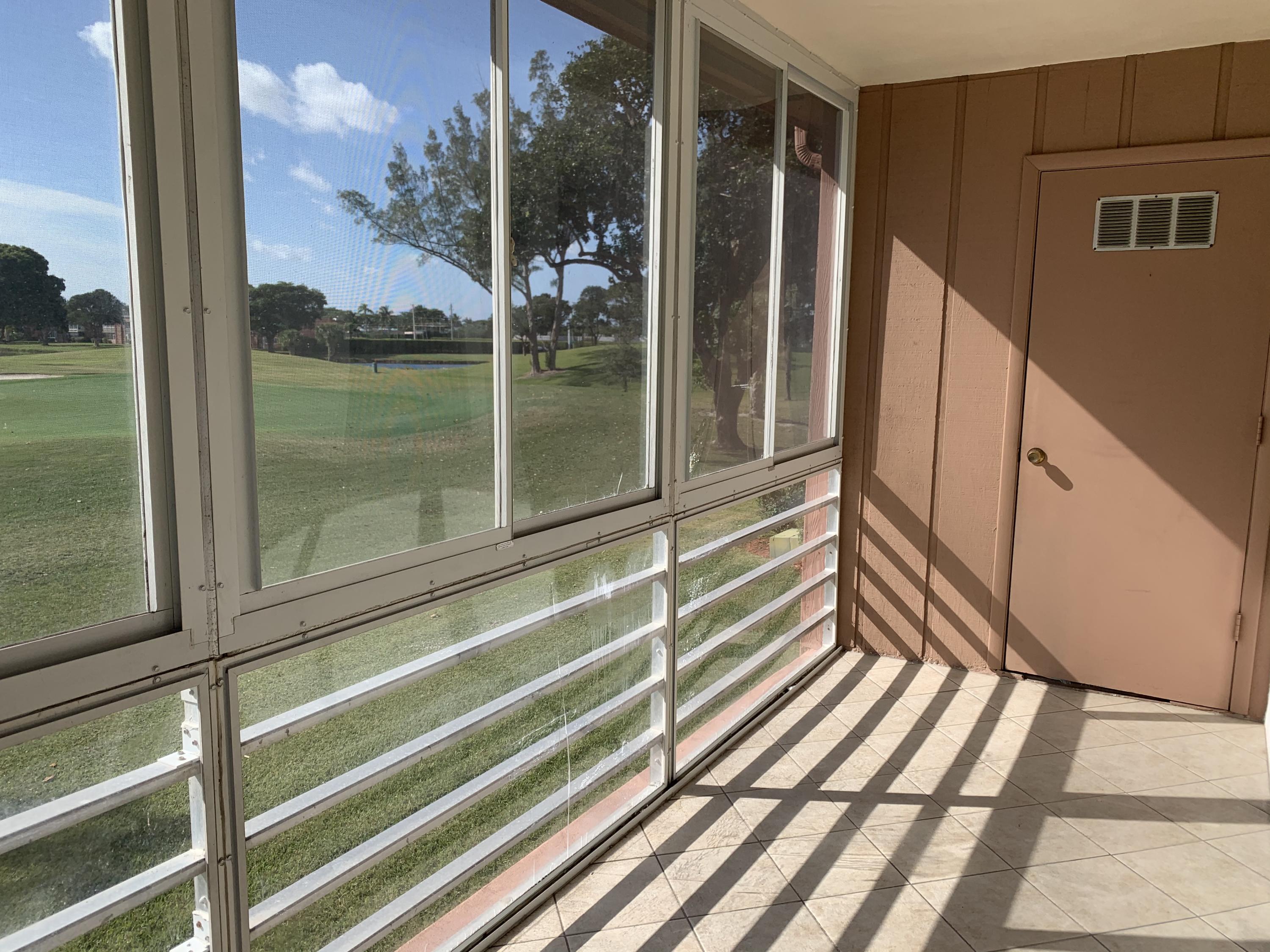 82 Normandy B Delray Beach, FL 33484 - Photo 17 of 31 a view of a balcony