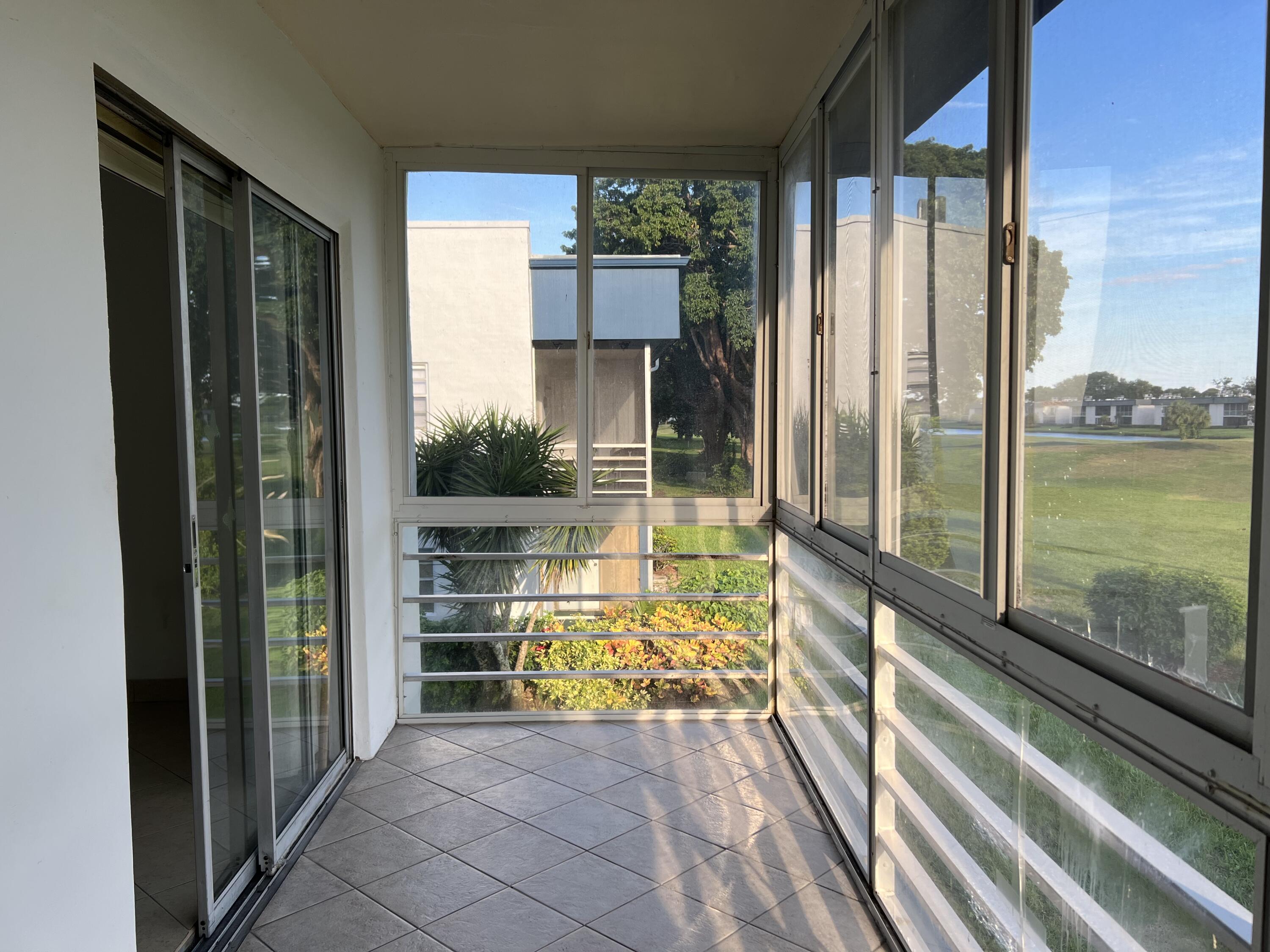 82 Normandy B Delray Beach, FL 33484 - Photo 22 of 31 a view of balcony with balcony
