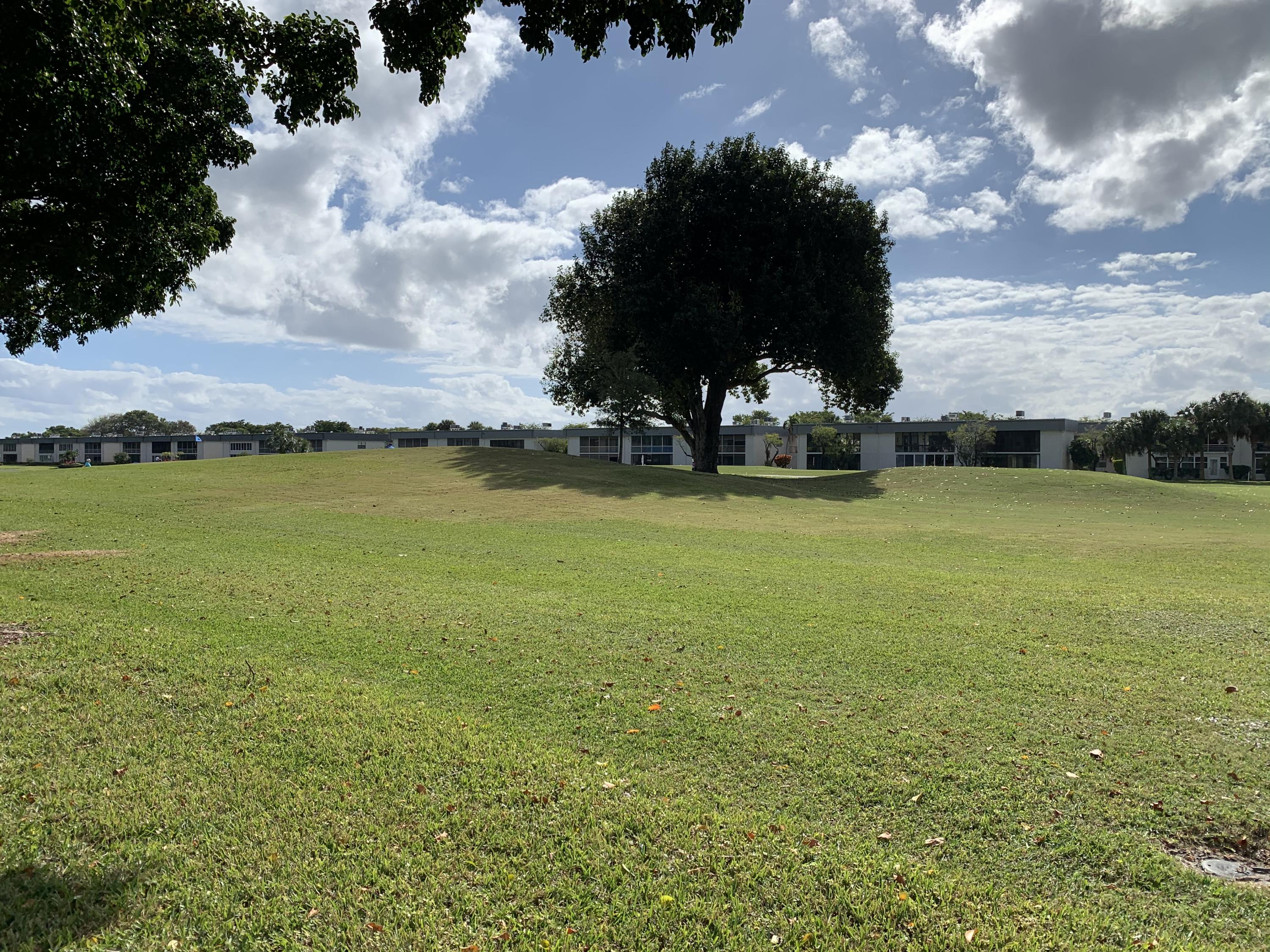 82 Normandy B Delray Beach, FL 33484 - Photo 23 of 31 a view of a ocean with beach