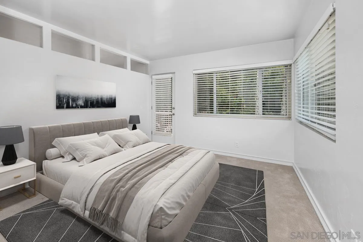 2600 Torrey Pines Road, Unit A31 La Jolla, CA 92037 - Photo 14 of 25 a bedroom with a bed and a window