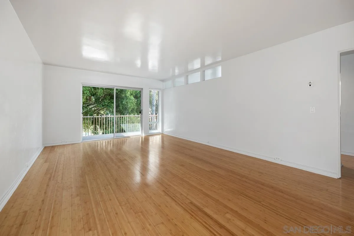 2600 Torrey Pines Road, Unit A31 La Jolla, CA 92037 - Photo 19 of 25 wooden floor in an empty room with a window