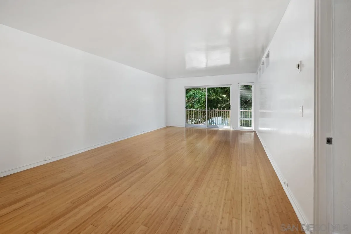 2600 Torrey Pines Road, Unit A31 La Jolla, CA 92037 - Photo 2 of 25 wooden floor in an empty room with a window