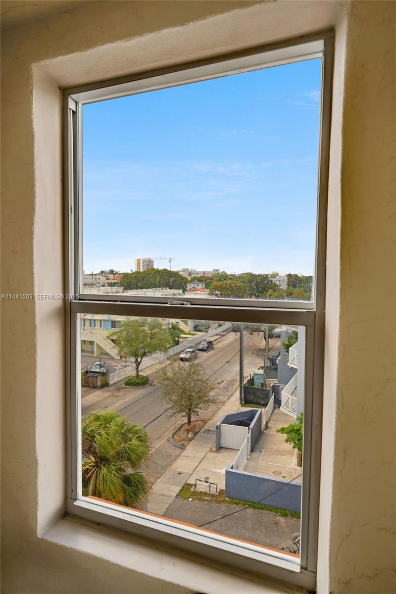 440 Southwest 5th Avenue Miami, FL 33130 - Photo 8 of 46 a view of a glass door and a window