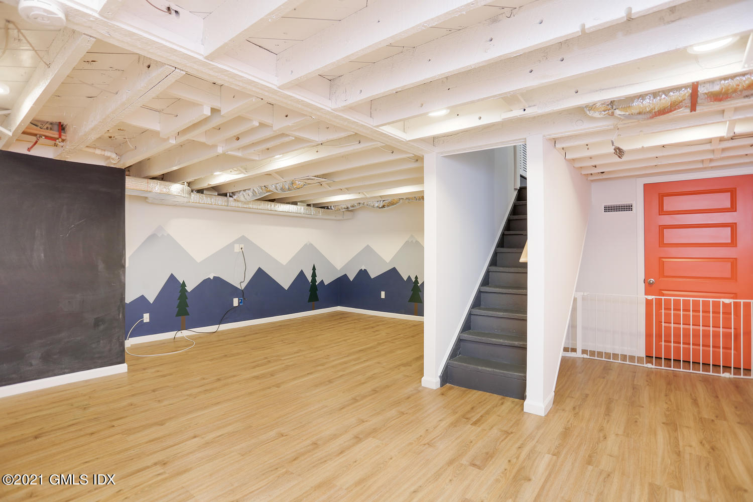 8 Potter Drive Old Greenwich, CT 06870 - Photo 11 of 11 a view of a room with wooden floor and stairs