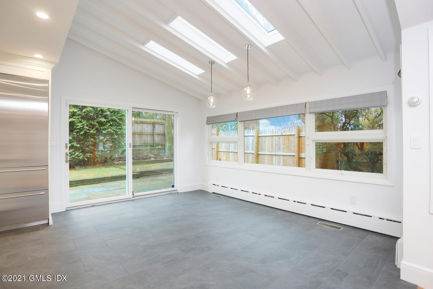 8 Potter Drive Old Greenwich, CT 06870 - Photo 4 of 11 a view of an empty room with a window