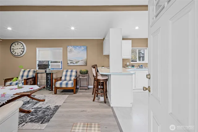 a living room with furniture and a table