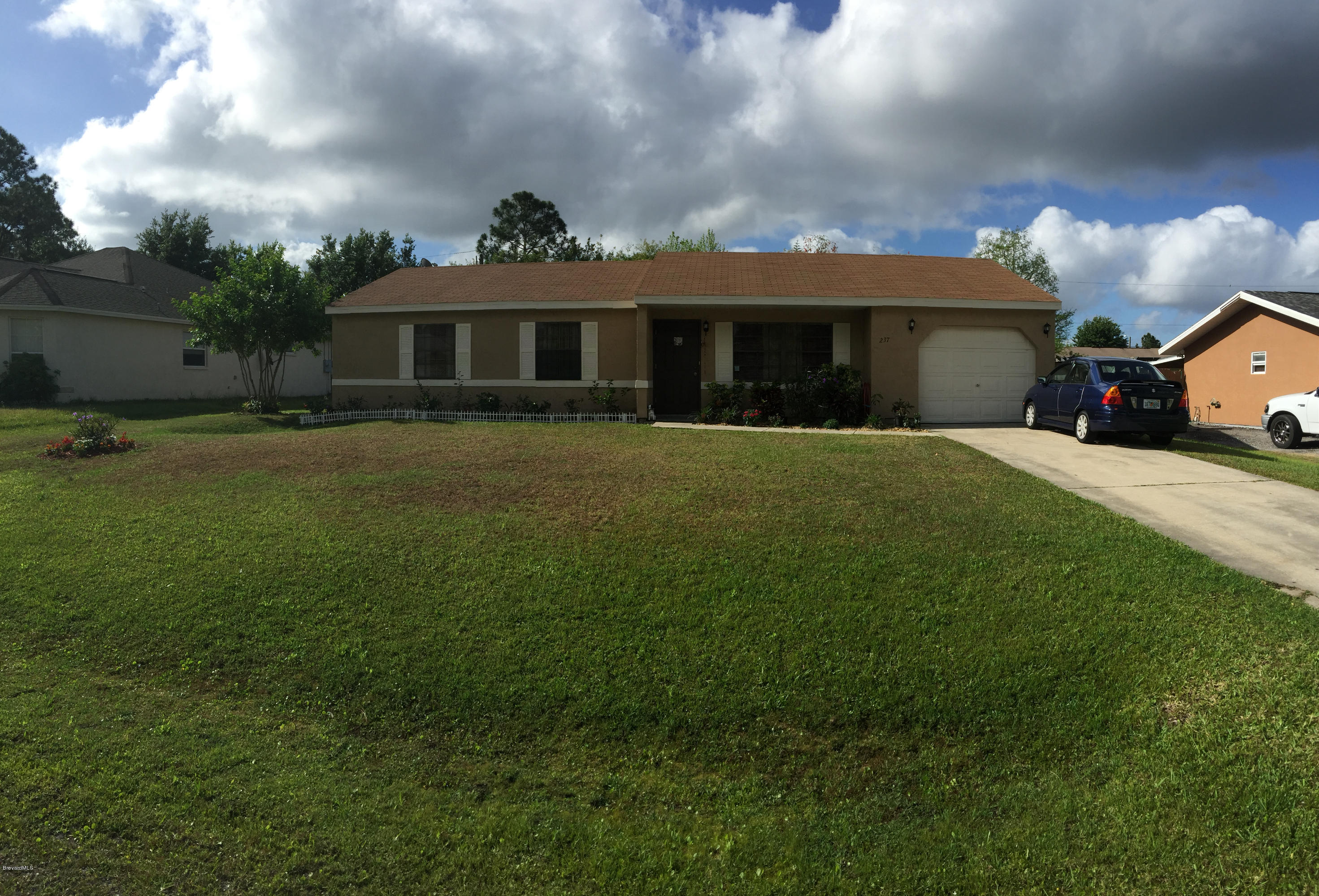 237 Abalone Road Northwest Palm Bay, FL 32907 - Photo 1 of 14 IMG_0724