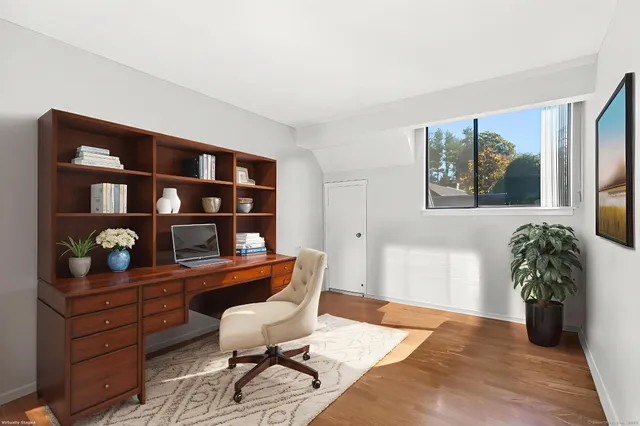 a workspace with furniture and lamp