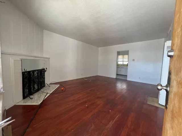 a kitchen with sink and cabinets
