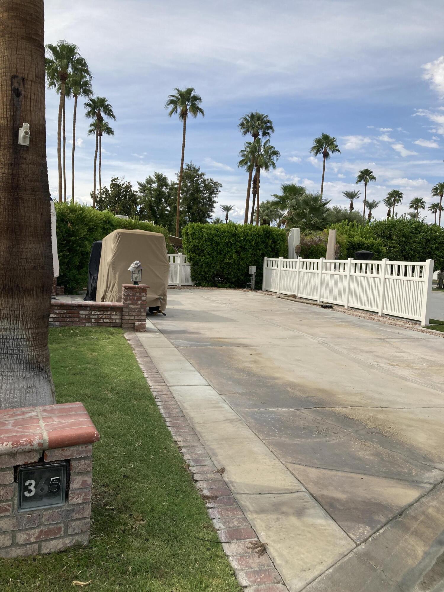 69411 Ramon Road, Unit 365 Cathedral City, CA 92234 - Photo 3 of 4 a view of a garden with a slide