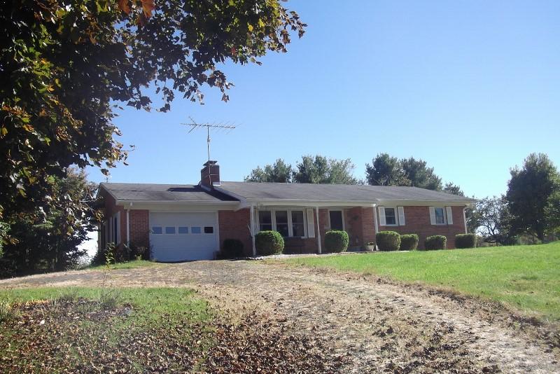 3728 Laurel Branch Road Northwest Floyd, VA 24091 - Photo 1 of 43 a front view of a house with a yard and trees