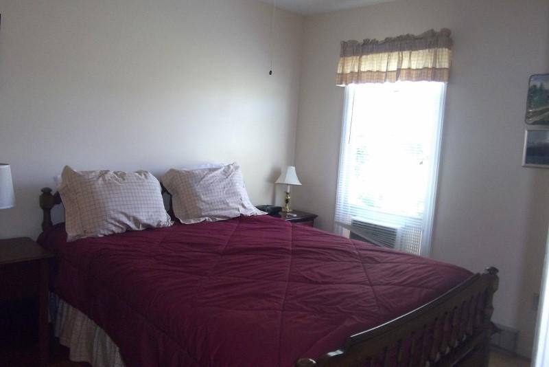 3728 Laurel Branch Road Northwest Floyd, VA 24091 - Photo 29 of 43 a bedroom with a bed and window