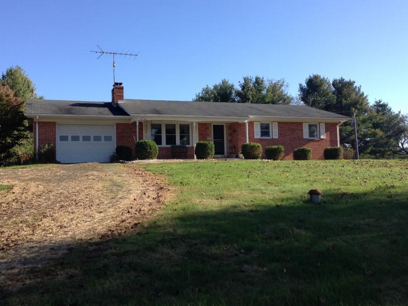 3728 Laurel Branch Road Northwest Floyd, VA 24091 - Photo 41 of 43 a front view of a house with a garden