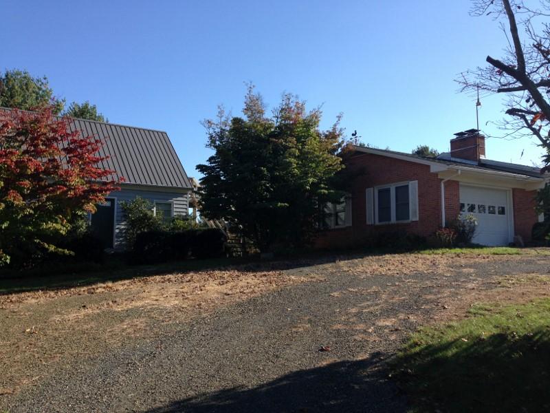3728 Laurel Branch Road Northwest Floyd, VA 24091 - Photo 43 of 43 a front view of a house with a yard