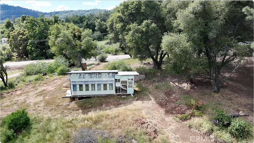 5643 Carleton Road Mariposa, CA 95338 - Photo 22 of 22 an aerial view of a house with a yard