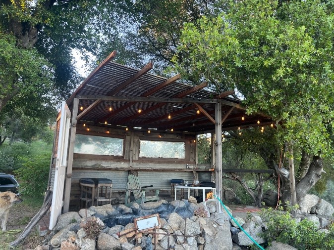 5643 Carleton Road Mariposa, CA 95338 - Photo 5 of 22 a patio with table and chairs and potted plants