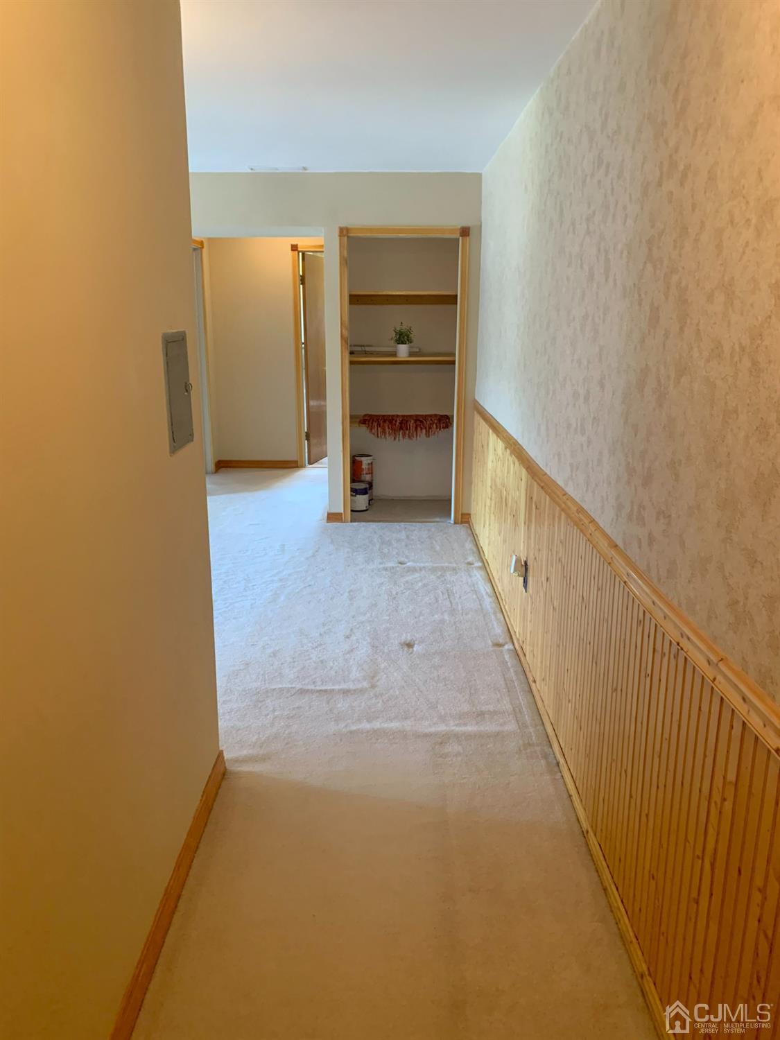 1517 Raspberry Court Edison, NJ 08817 - Photo 3 of 15 a view of a hallway with wooden floor and stairs