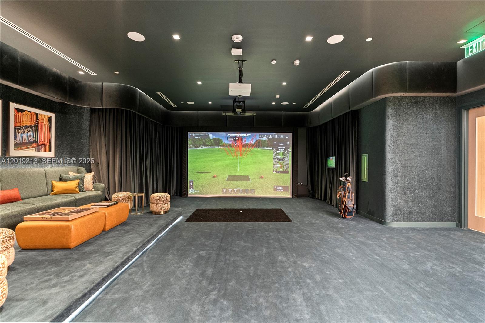 77 Southeast 5th, Unit 3702 Miami, FL 33131 - Photo 60 of 63 a living room with furniture and a flat screen tv